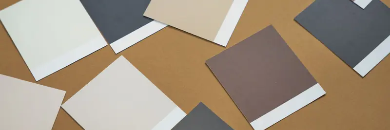 Fanned paint swatches showing a spectrum of colours