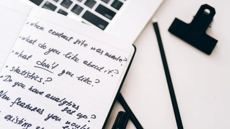 A handwritten list in an open notebook