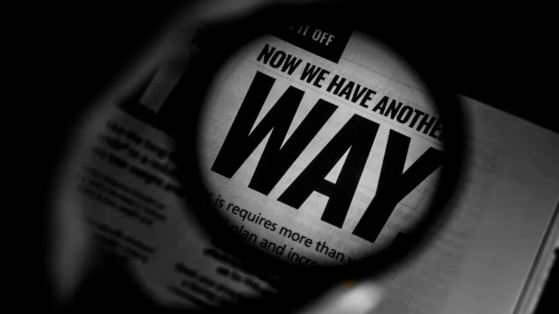 Newspaper headlines photographed close up
