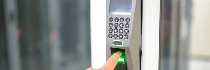 A fingerprint pattern rendered on a glowing digital surface
