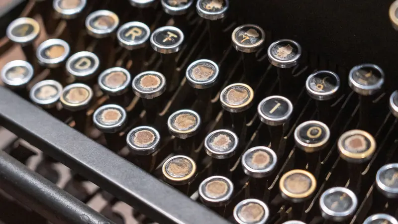 Metal movable type arranged in a printer's composing stick