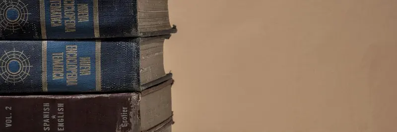 A heavy reference volume open on a desk