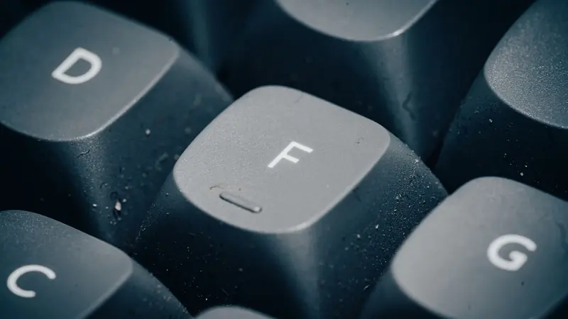 Extreme close-up of the letter keys on a mechanical computer keyboard