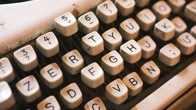 The keys of a vintage typewriter photographed close up